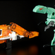 Illustration for article titled Transforming Dino-Cassettes Join a Retro '80s Bumblebee For This Comic-Con Exclusive